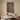 Earthy brown abstract painting in wood frame