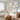 Large 2 piece textured abstract canvas wall art set with warm peach and navy impasto patches adding balance to a modern organic living room.