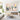 Vertical 2 piece hand painted textured pastel canvas art set displayed along a bright gallery hallway creating a welcoming artistic focus.