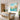 Refreshing turquoise and yellow floral abstract canvas painting creating a cheerful light atmosphere mounted above a wooden dining table.