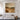 Textured looking countryside artwork in cream and warm brown