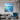 Textured blue ocean landscape painting hanging on a gray living room wall above a modern sofa and blue accent armchair.